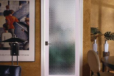 Example of a mid-century modern dining room design in Orange County