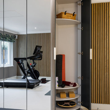 BESPOKE MIRRORED CABINETRY AND WALL PANELLING FOR A LUXURY HOME GYM