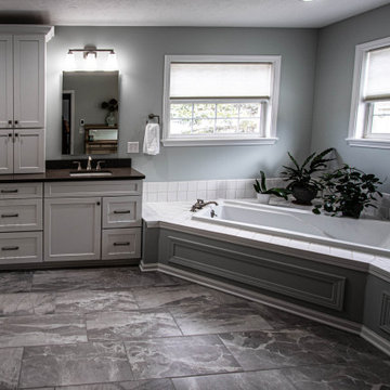 White Master Bath with Pepper Leathered Quartz Countertops