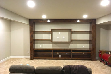 This is an example of a large modern basement in Denver.