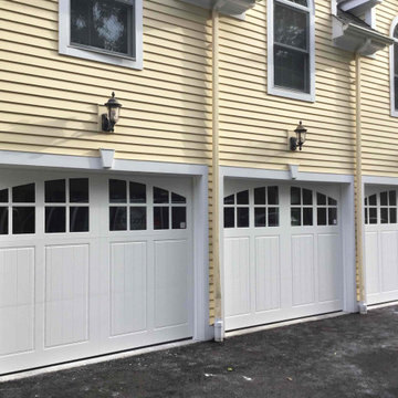 Three Modern Carriage House Garage Doors in White