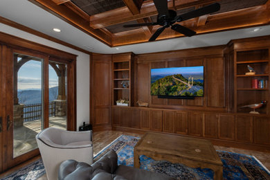 Example of a mountain style family room design in Other