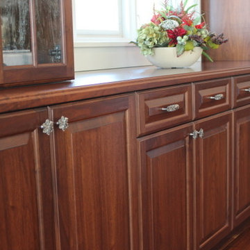 Beautiful Kitchen Featuring the Opulent Scroll Pulls & Opulent Flower Wood Knobs