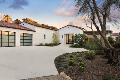 Inspiration for a contemporary one-story exterior home remodel in Other