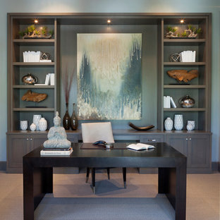 Photo of a transitional home office in Miami.