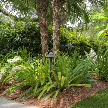 The Chloe Hotel | Garden Seating Beneath the Palms