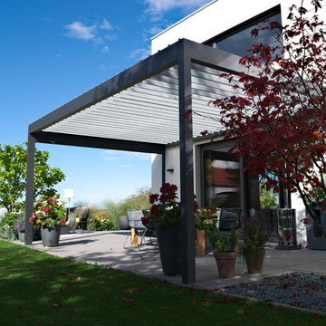 Frei zu öffnendes Terrassendach für ein Einfamilienhaus in München