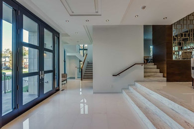 Entryway - contemporary entryway idea in Toronto