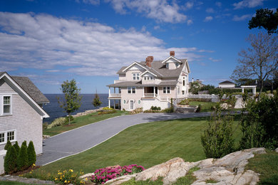 Huge beach style gray three-story wood gable roof photo in Boston