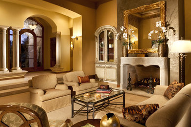 Large traditional formal enclosed living room in Phoenix with brown walls, carpet, a standard fireplace and a wood fireplace surround.