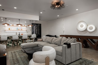Basement - large modern concrete floor basement idea in Charlotte with white walls