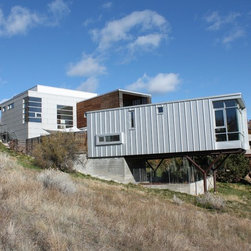 Modern Home With Insolroll Silver Screen Motorized Shades - Products