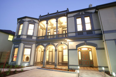 Photo of an expansive traditional home design in Melbourne.