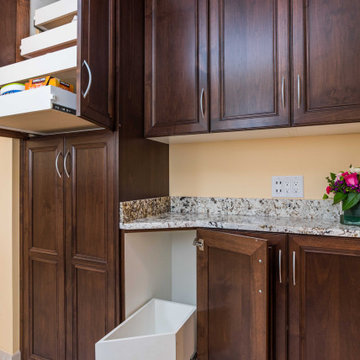 Transitional Style Laundry/Mudroom With Medium Stained Maple Cabinets