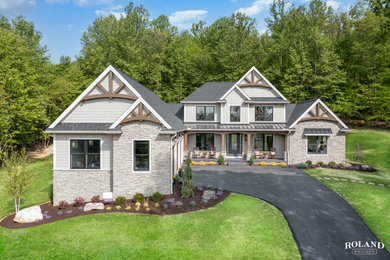 Example of an arts and crafts two-story exterior home design in Other