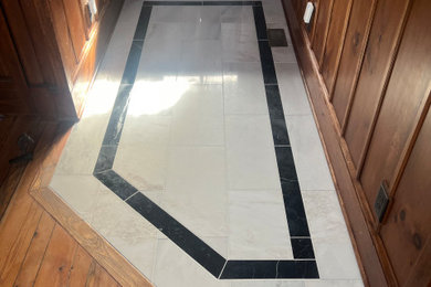 Entryway - marble floor entryway idea in Other