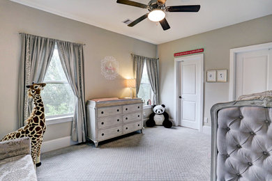 Nursery - mid-sized transitional girl carpeted and gray floor nursery idea in Houston with beige walls
