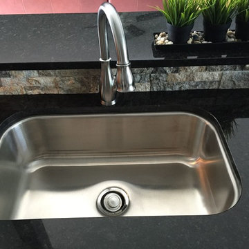 Black Pearl Granite and Supreme Stackstone Silver Backsplash