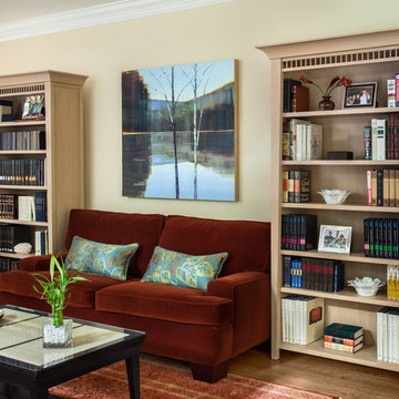 Family Room with Book Storage by Danziger Design - Chevy Chase, MD