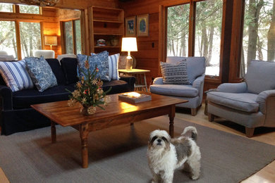 Living room - rustic open concept light wood floor living room idea in Milwaukee