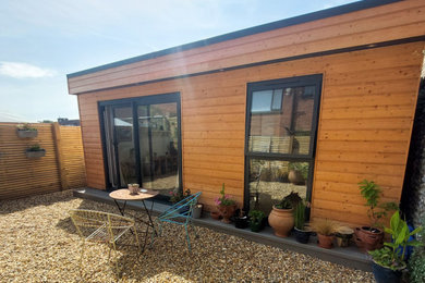 Photo of a contemporary garden shed and building in Kent.