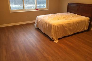 Bedroom - mid-sized vinyl floor bedroom idea in Minneapolis