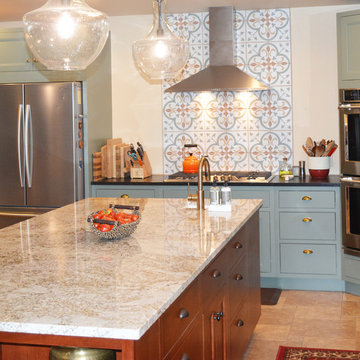 Notice her gorgeous backsplash as well as the uniquely placed angled wall oven.