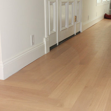 Refinish existing floors matching new floor installed.