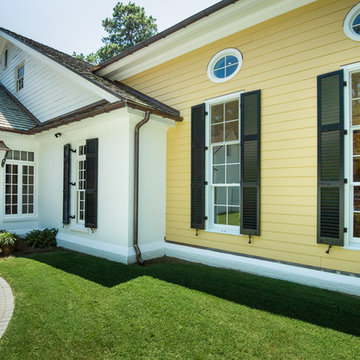 David Residence - Triple Hung & Pivot Oval Windows