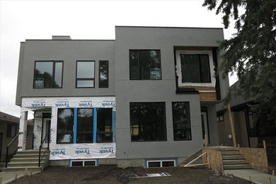 Minimalist gray two-story exterior home photo in Edmonton