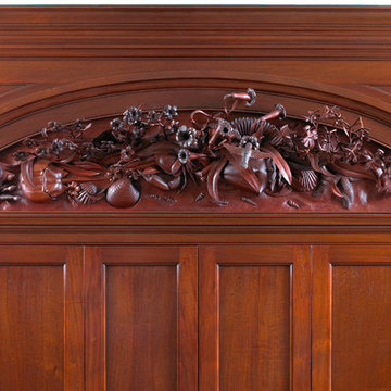 Arched pediment carving