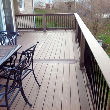 AZEK Deck with Timbertech Builderrail and Genovations Brownstone post wraps