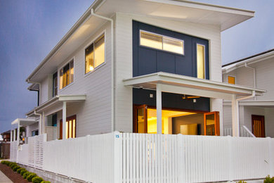 Design ideas for a beach style two-storey exterior in Gold Coast - Tweed.