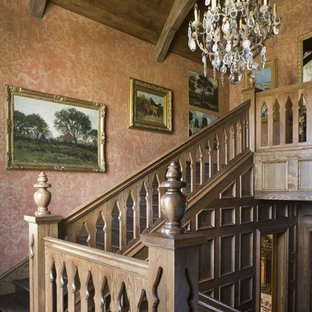 This is an example of a traditional wood staircase in Dallas with wood risers.