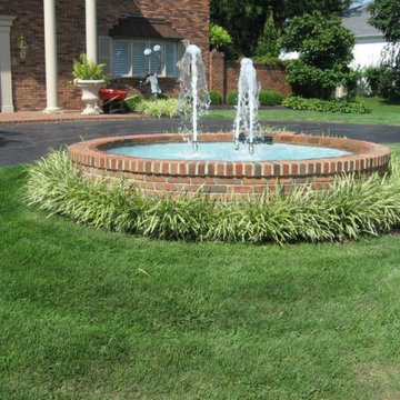 Solid Brick water fountain & paver porch built in 2001 still works today