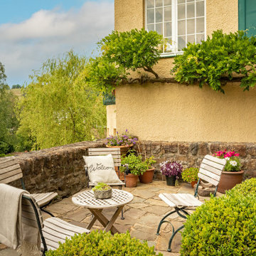 Fotostyling einer rustikalen Immobilie im romantischen Stil