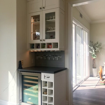 Elegant stacked kitchen cabinets in white shaker style
