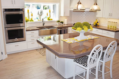 Example of a cottage home design design in Denver