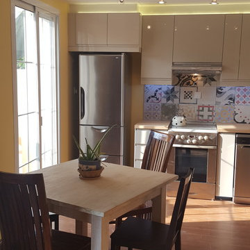 Kitchen on a low budget, storage above stairs , laundry