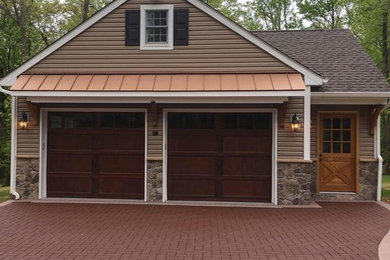 Inspiration for a large craftsman detached two-car garage workshop remodel in New York