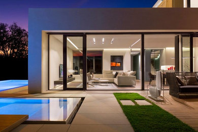 Foto di un soggiorno minimalista di medie dimensioni e aperto