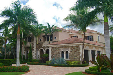 Mediterranean exterior home idea in Miami