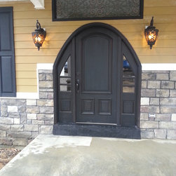 Ridgecrest - ER front entry door features eliptical radius and custom sidelights - Front Doors