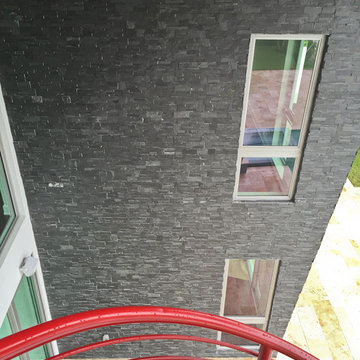 Hall with Nero Format Natural Stone Panels