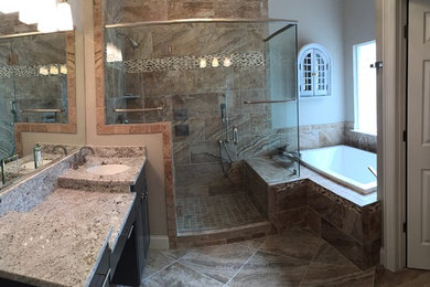 Inspiration for a master drop-in bathtub remodel in Birmingham with an undermount sink and granite countertops