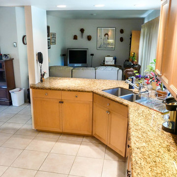 Angled Wall Transforms Corridor Kitchen