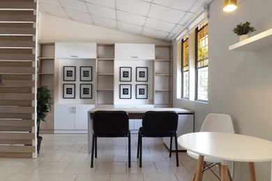 Example of a trendy home design design in Other