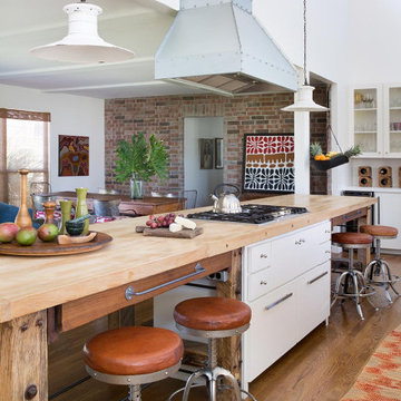 Coastal RanchThis rambling ranch house has a unique footprint and sits on an ext