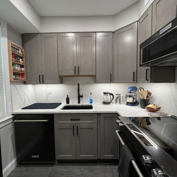 Modern Gray Kitchen Remodel with Quartz Surfaces
