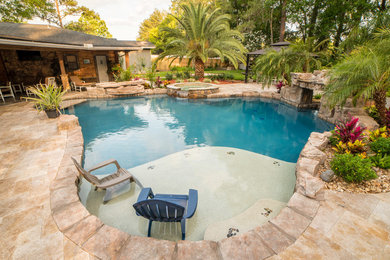 Example of an island style pool design in Jacksonville